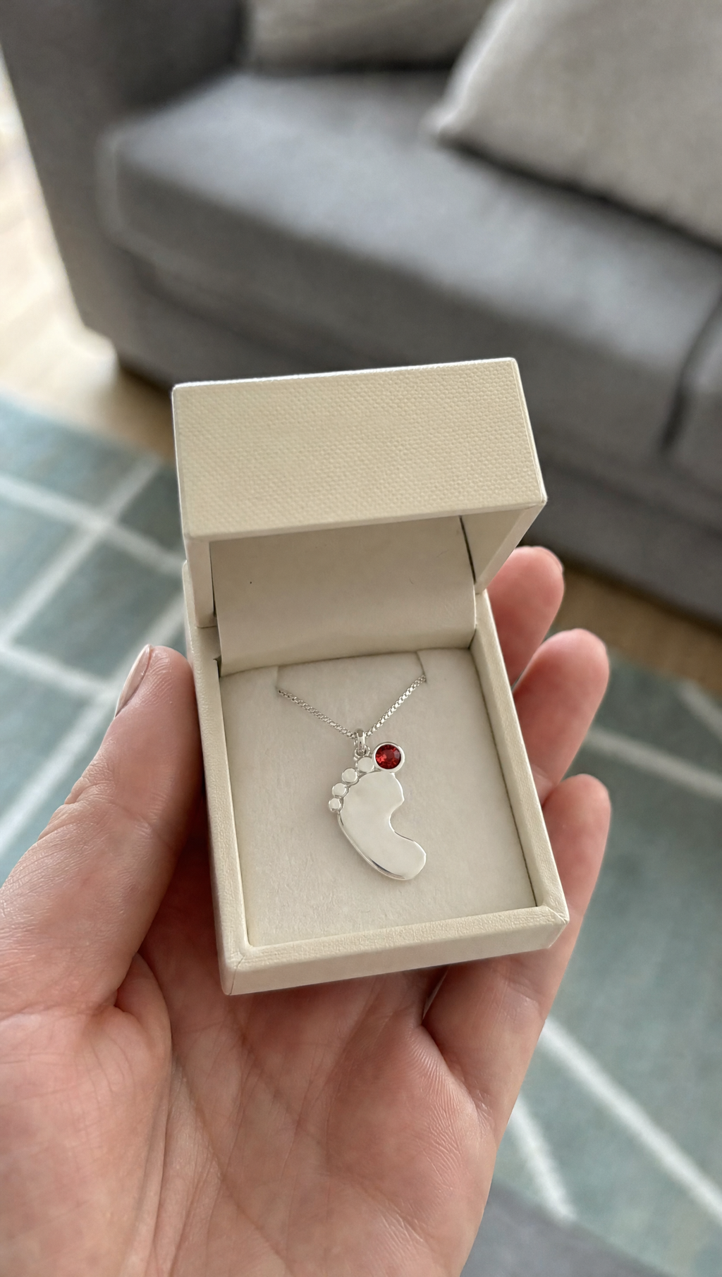 The necklace in its gift box
